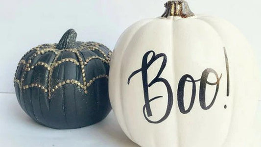 Black and white painted pumpkins.