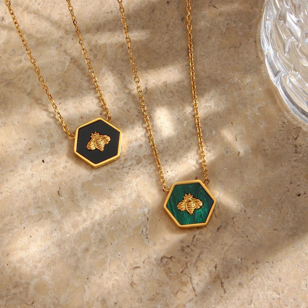 Bee Hexagon Gold Necklaces in green or black.