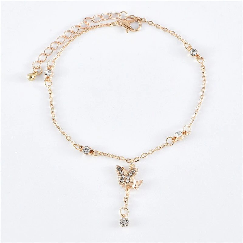 Dainty ankle bracelet with a CZ butterfly charm.