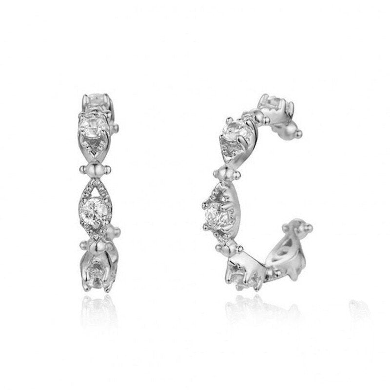 Silver ear cuffs with CZ stones.