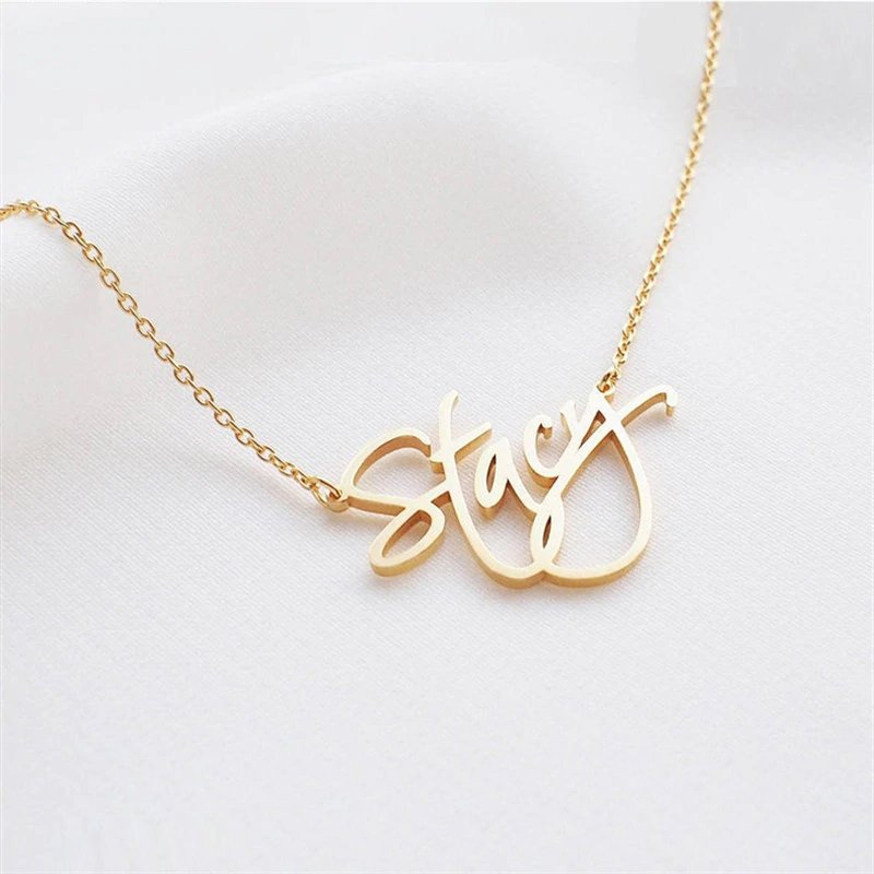 Gold cursive script Custom Name Necklace.