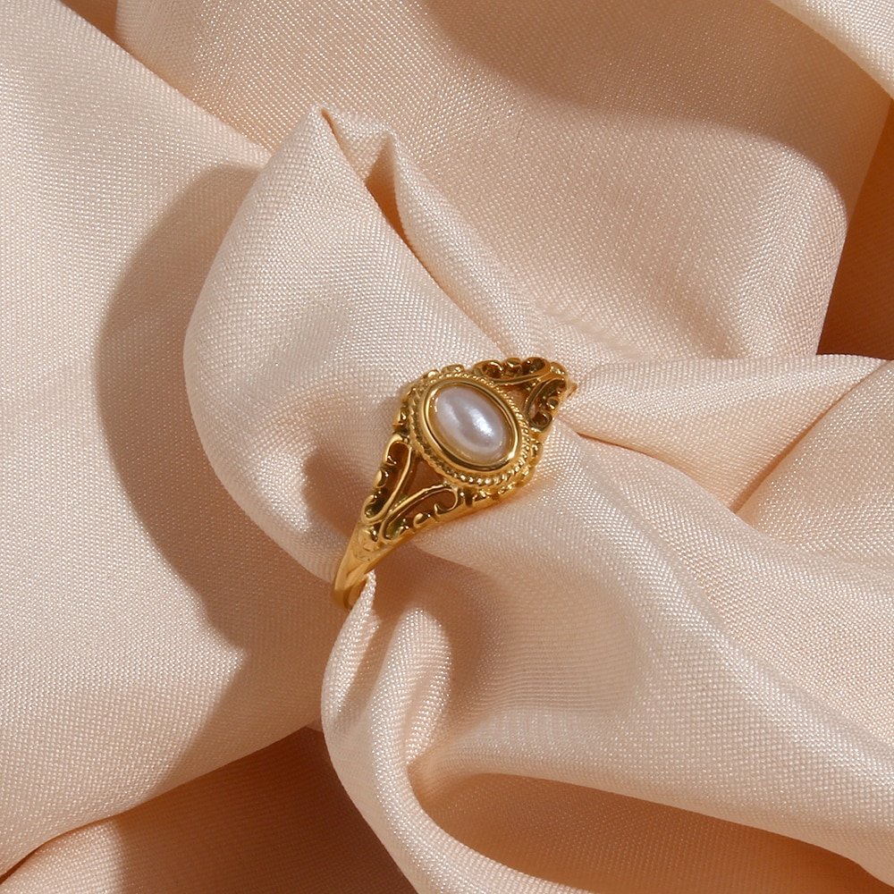 Closeup of the Filigree Pearl Gold Signet Ring.