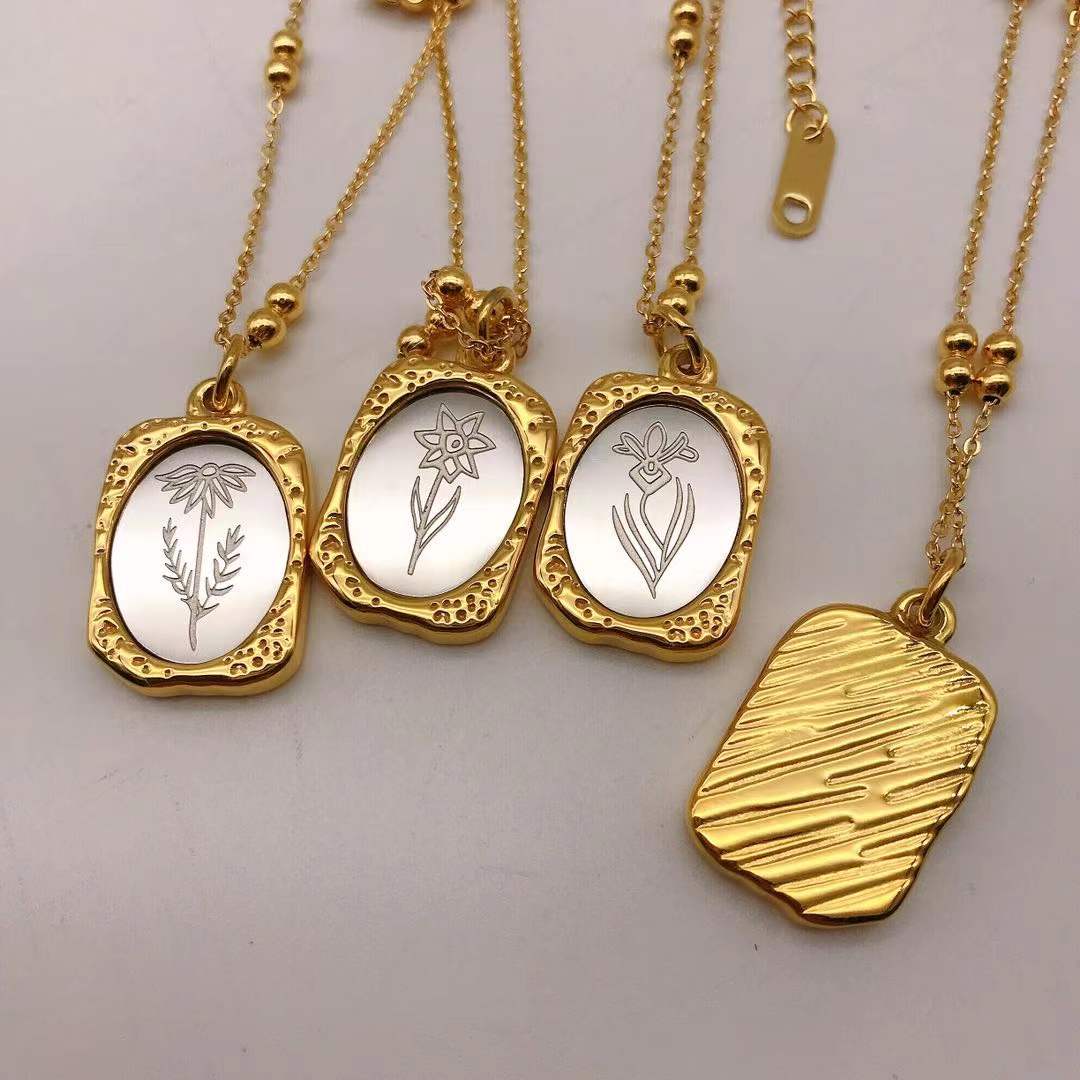Front and back view of the Mirrored Birth Flower Gold Necklace.