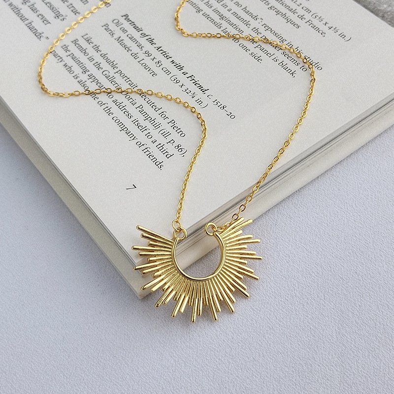 Coseup of the Sunburst Pendant Necklace.