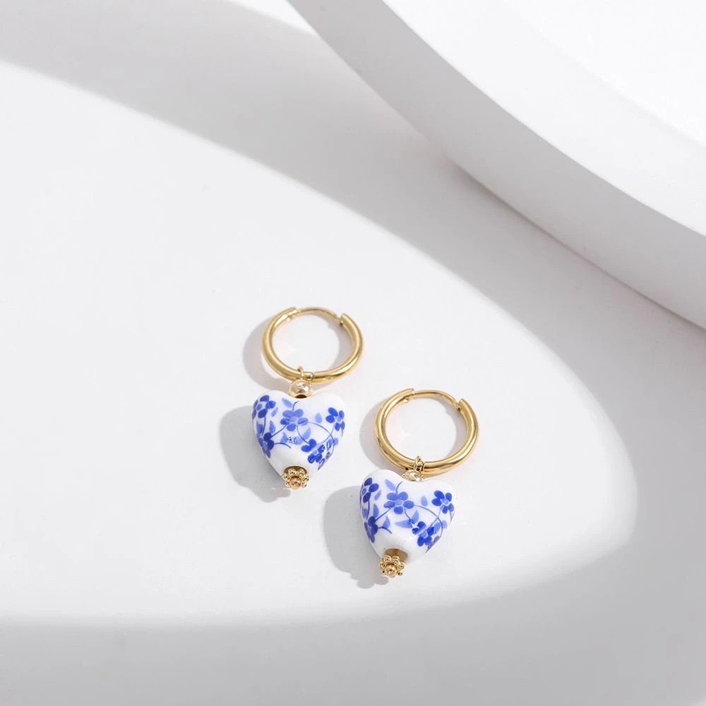 Floral blue and white ceramic earrings.