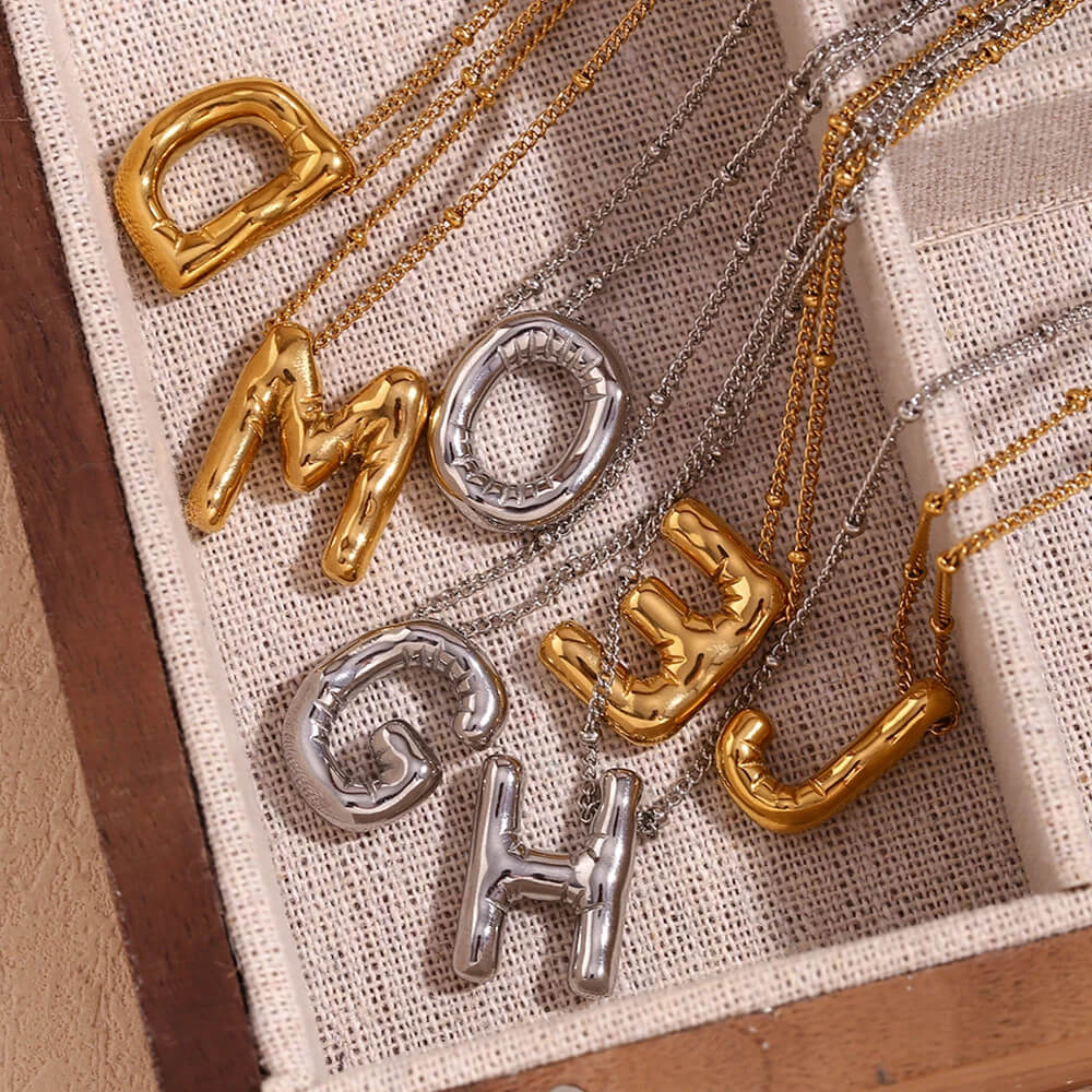 Bubble Letter pendants on delicate Necklace.