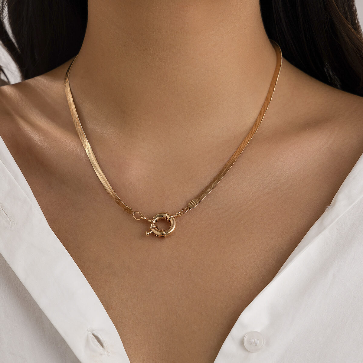 A model wearing the Front Clasp Gold Snake Chain Necklace.