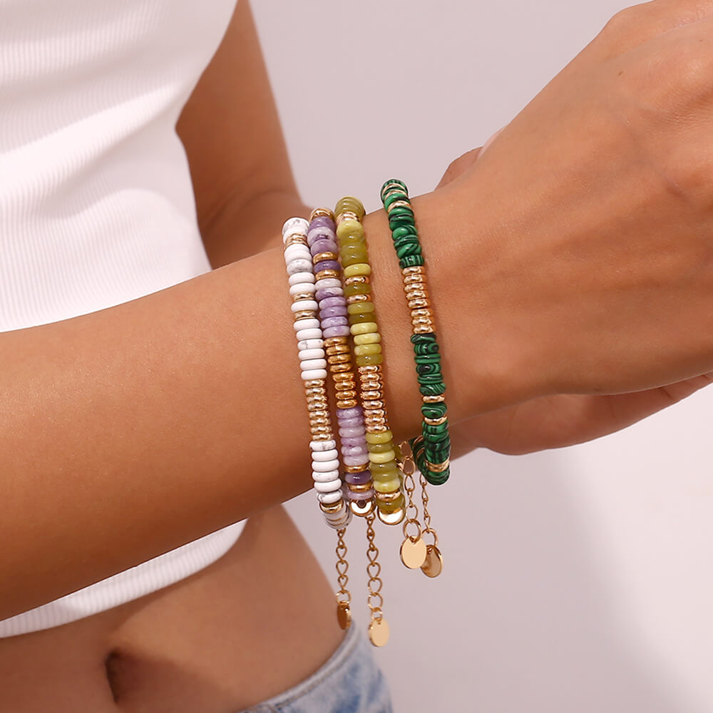 A model wearing the Gemstone Rondelle Beaded Gold Bracelet.