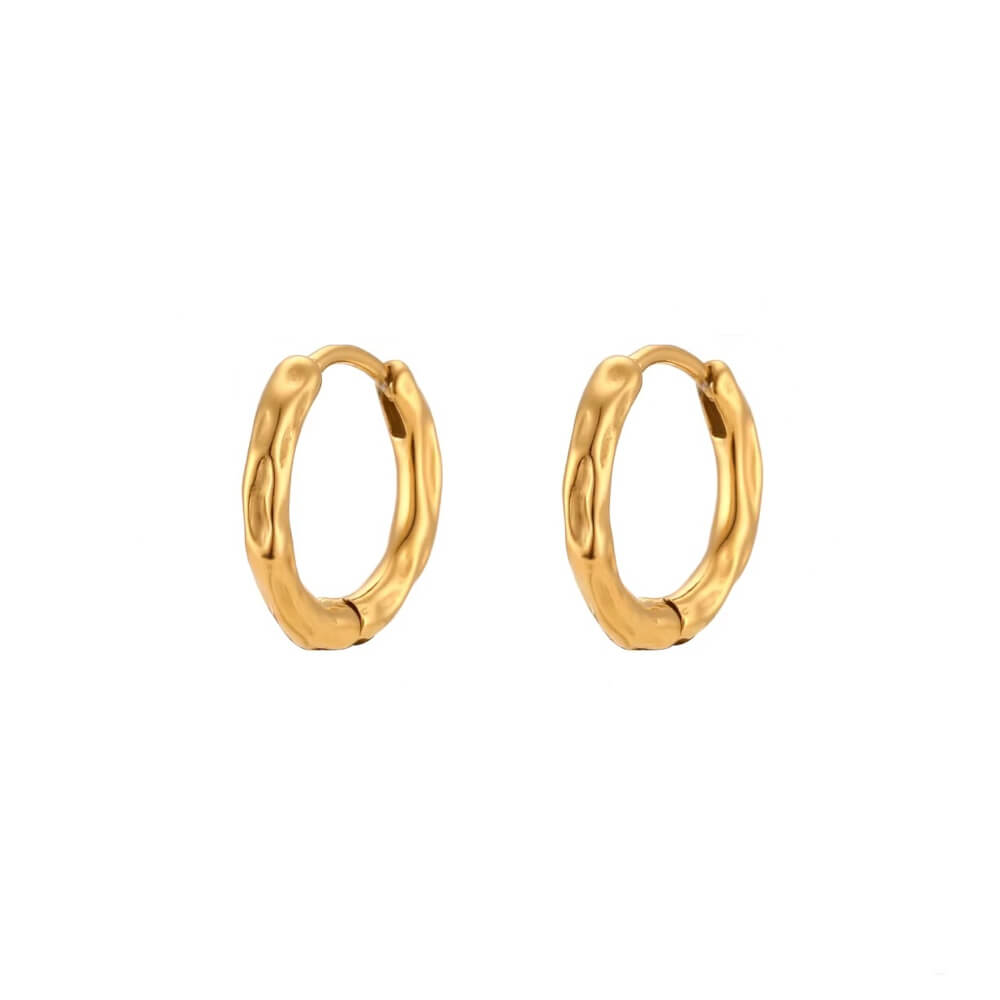 Gold hoop earrings on a white background.