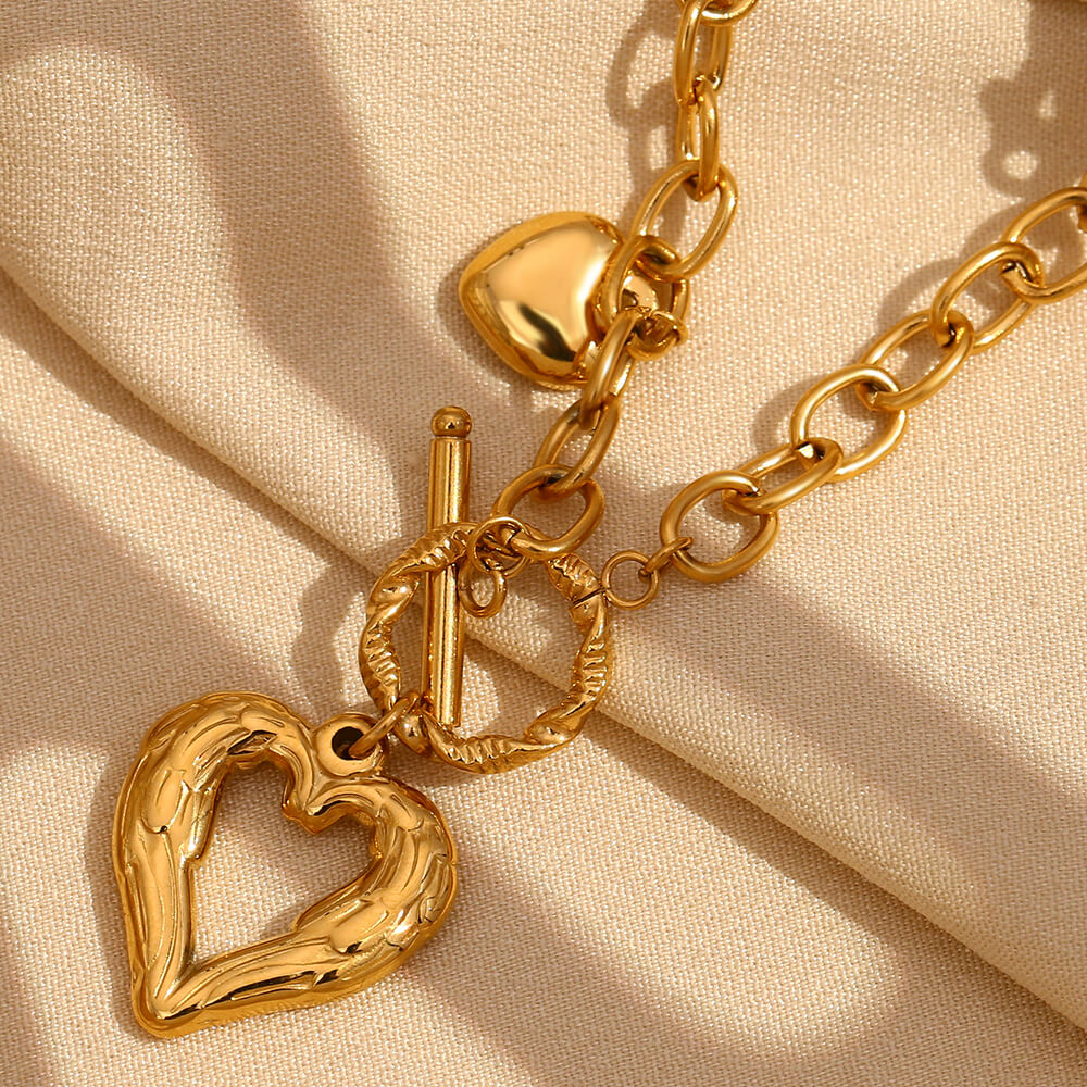 Closeup of the Heart Font Clasp Gold Necklace.