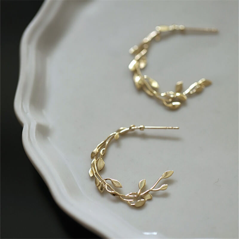 Closeup of the gold Mistletoe Hoops.