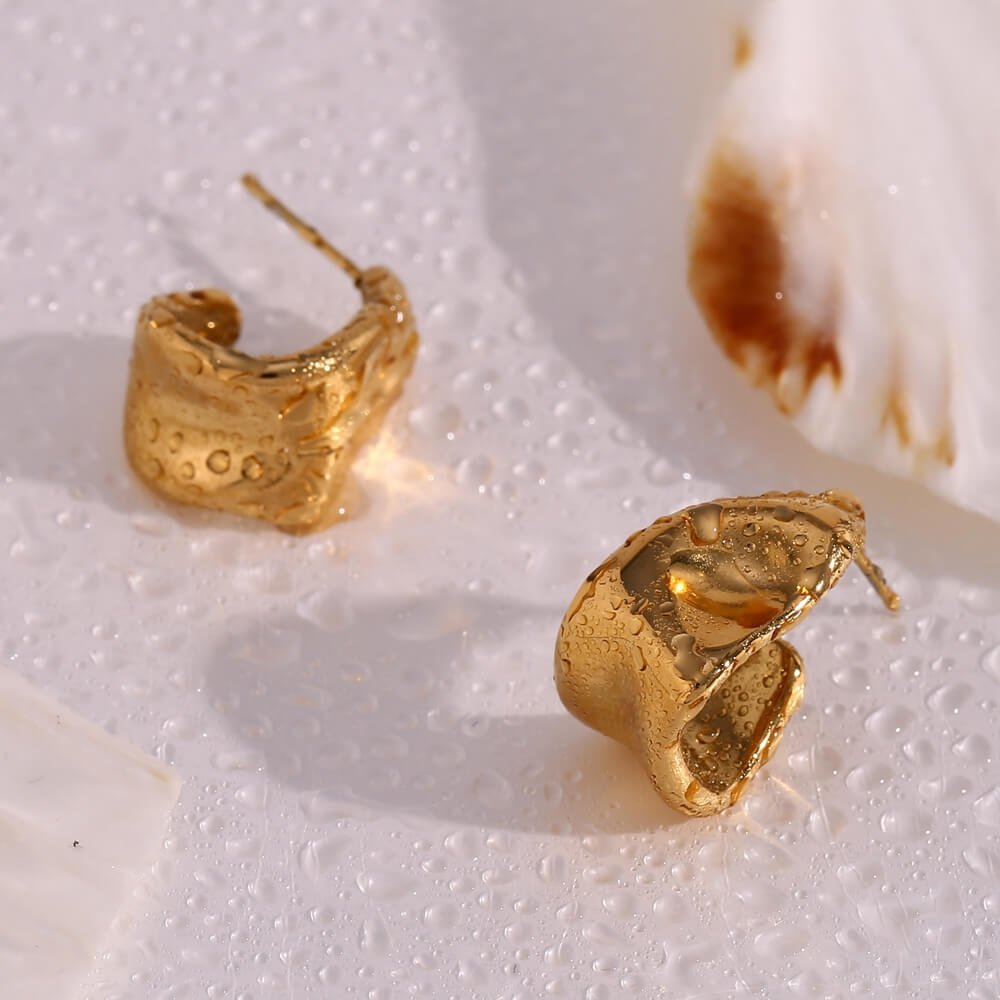 Waterproof gold hoops.