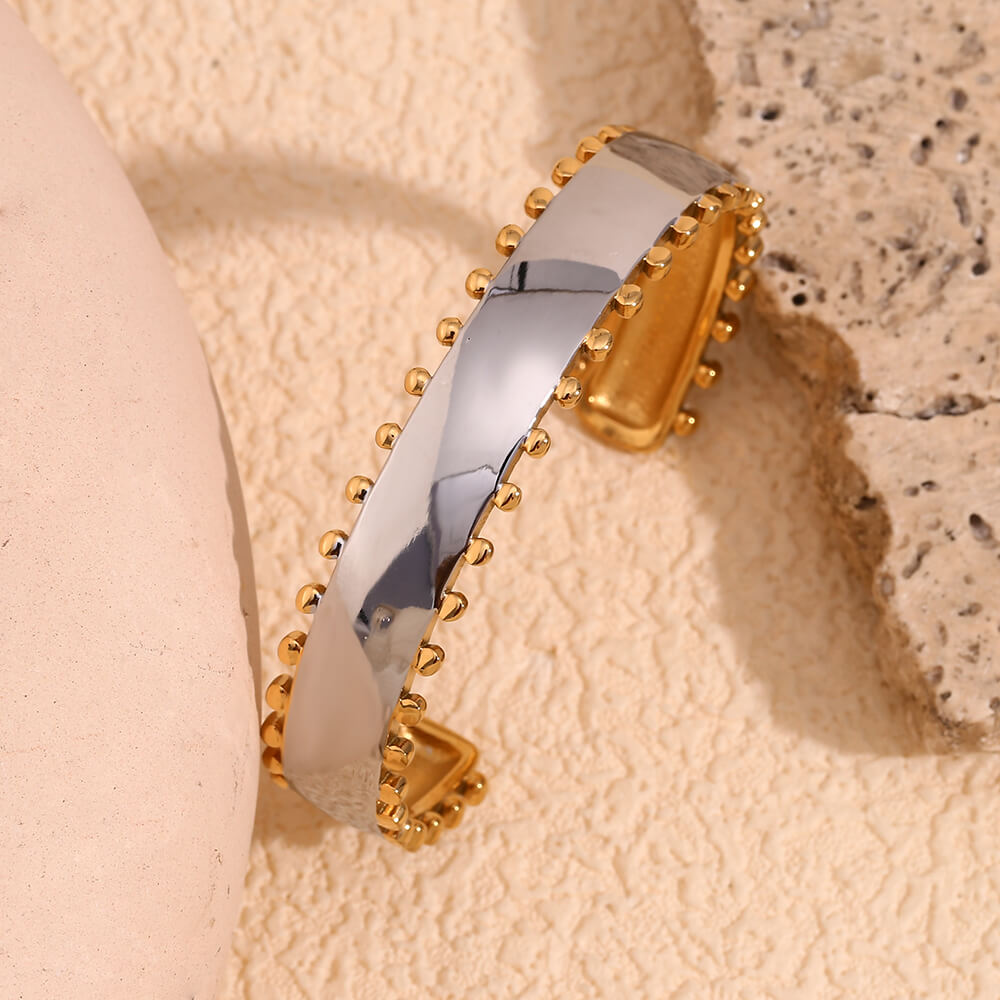 Gold and silver bangle.