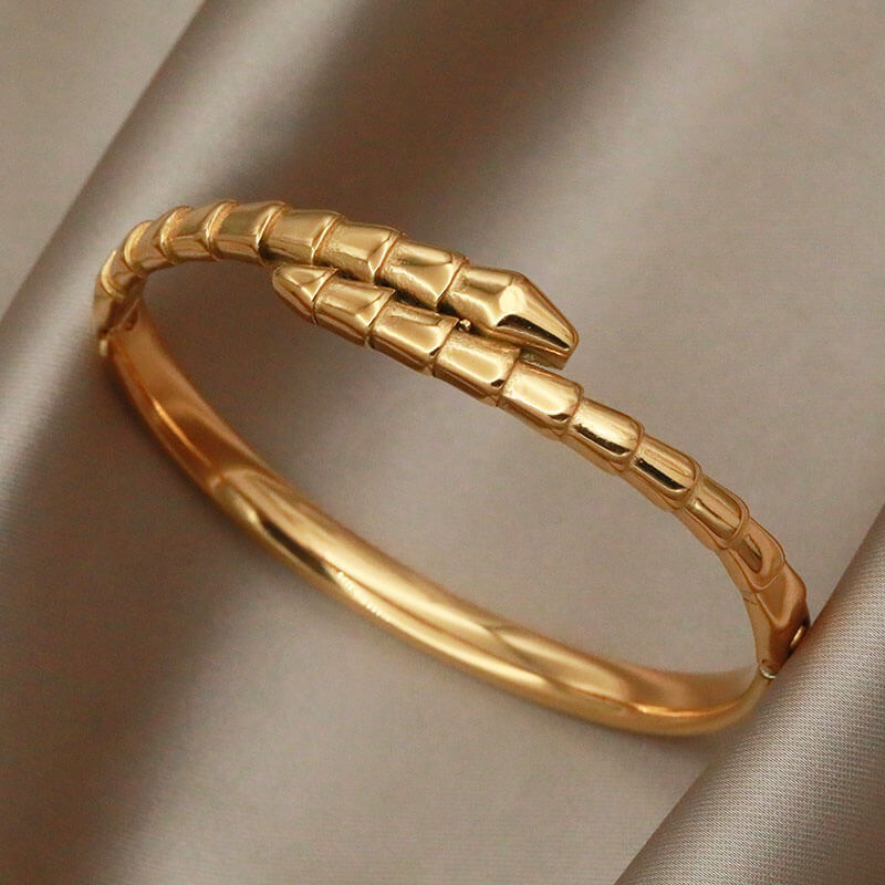 Gold textured snake bangle.