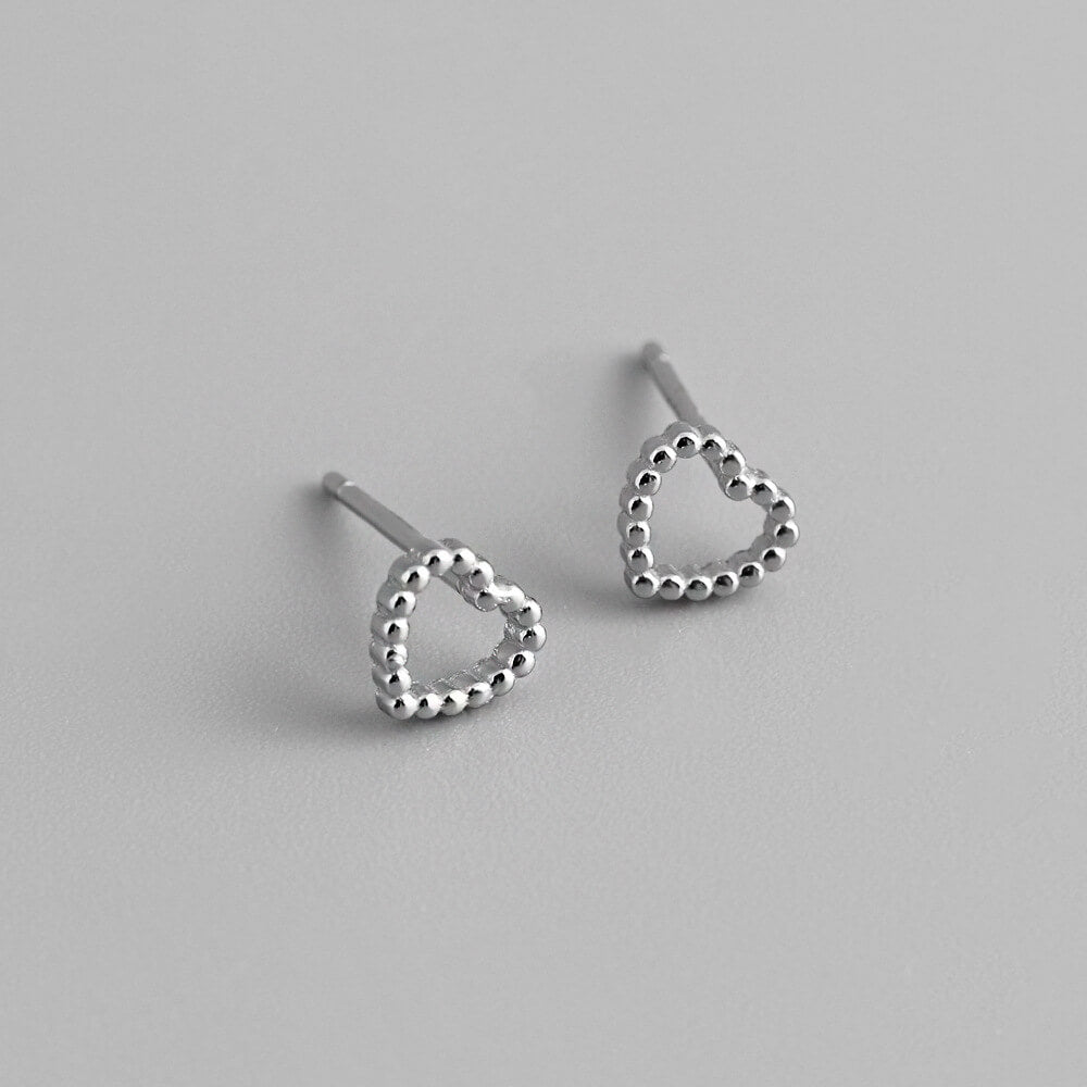 Closeup of the silver Beaded Heart Studs.