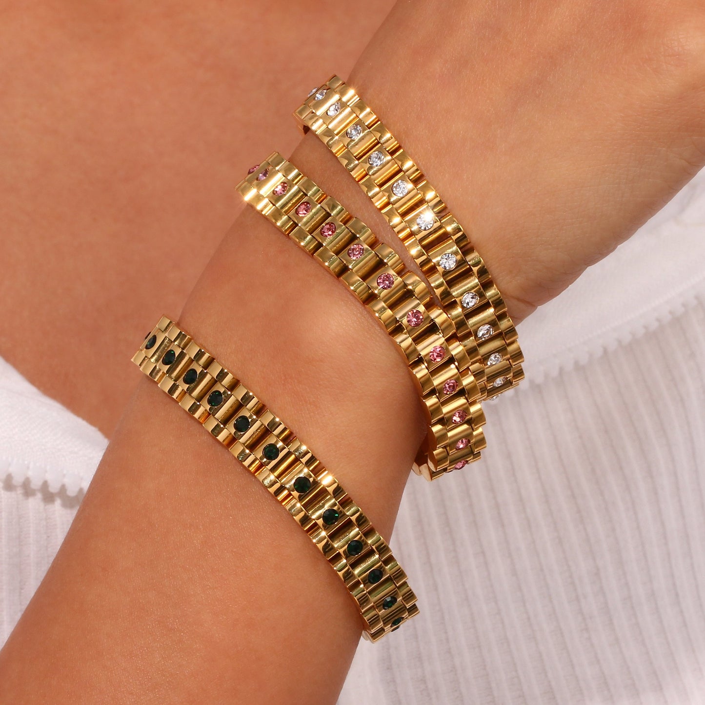 A model wearing the CZ Watchband Gold Bracelet.