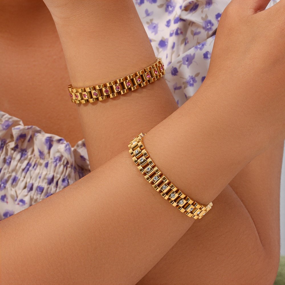 A woman wearing the CZ Watchband Gold Bracelet.