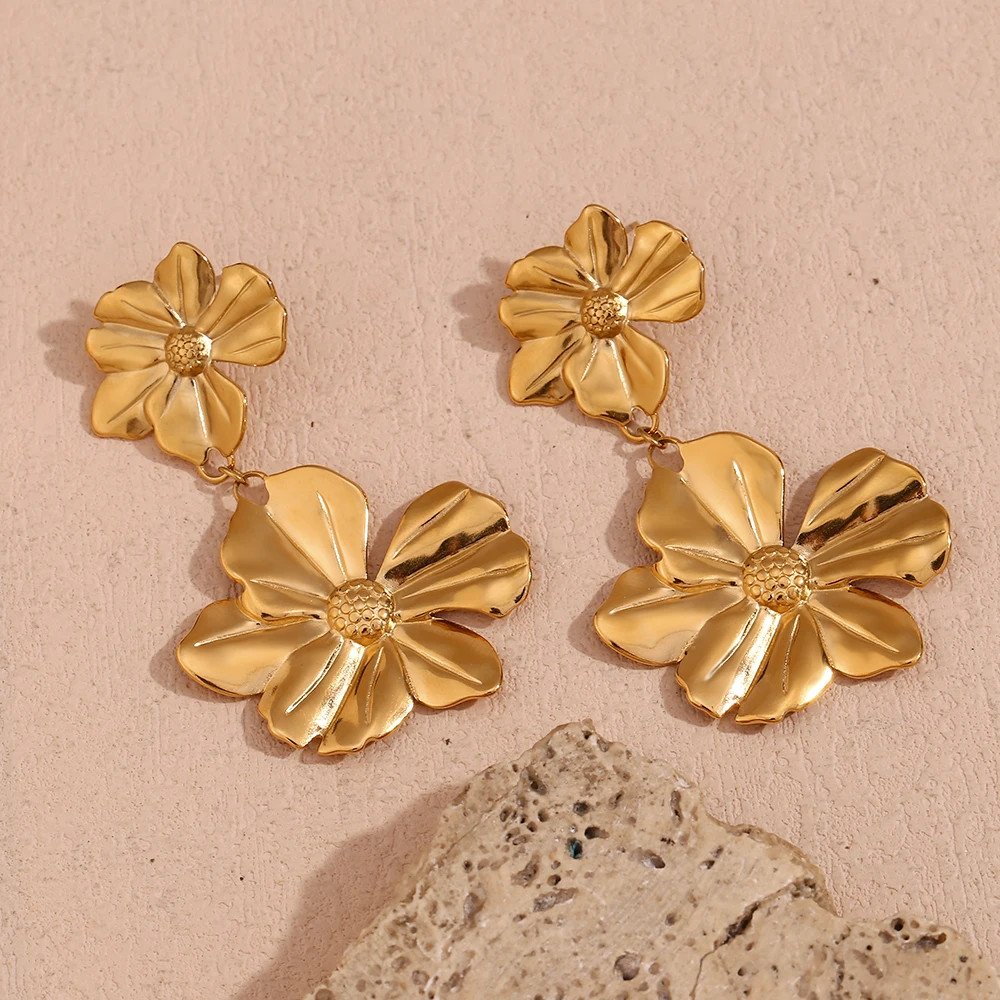 Closeup of the Gold Flower Drop Earrings.