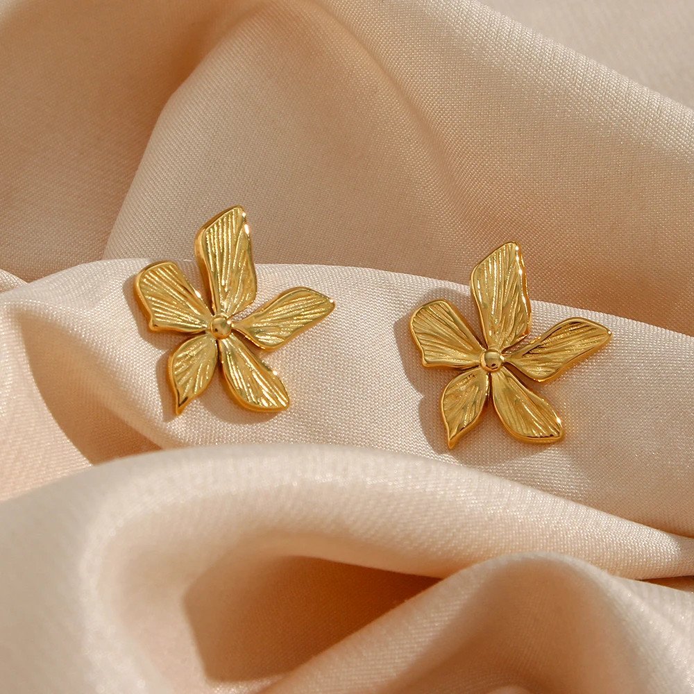 Closeup of the Lily Flower Gold Earrings.