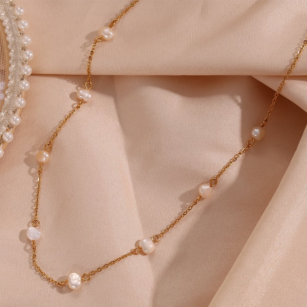 Closeup of the Pearl Chain Gold Necklace.