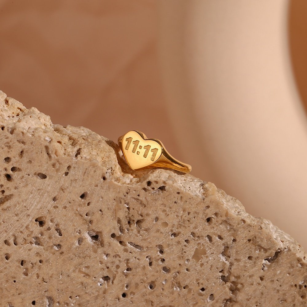 Closeup of the 11:11 Gold Heart Ring.