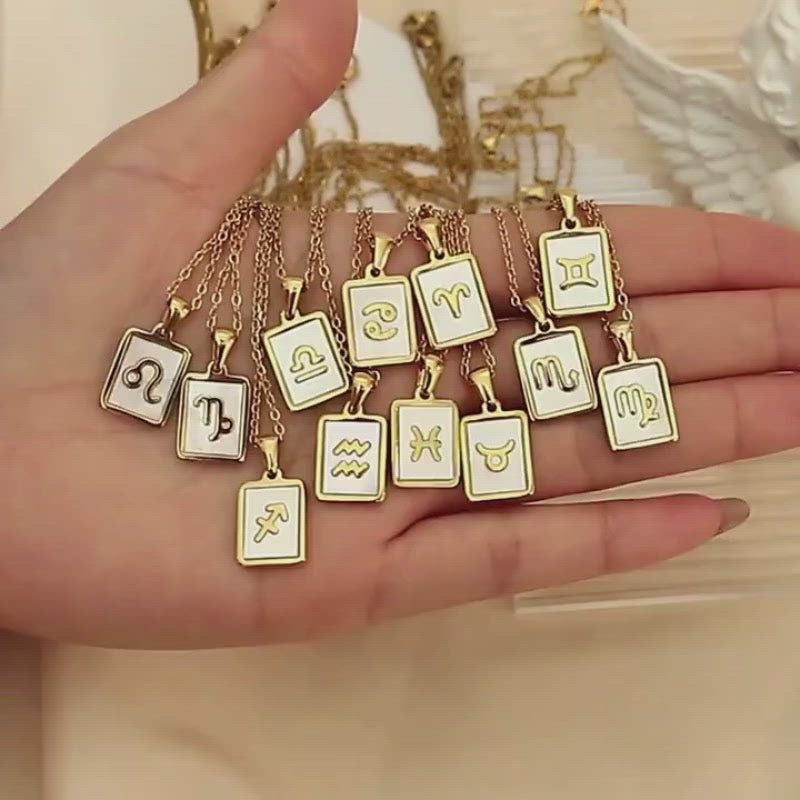 A video showing the Mother of Pearl Zodiac Gold Necklaces.