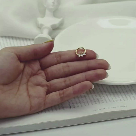 A video showing the Marquise Crown Rook Cartilage Hoops.