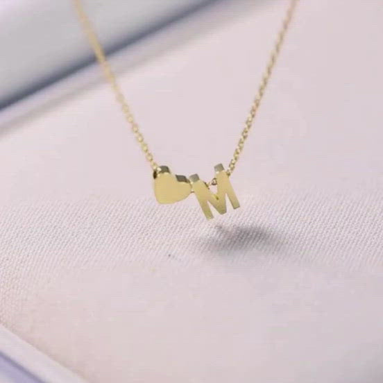A video showing the heart Initial Necklace.