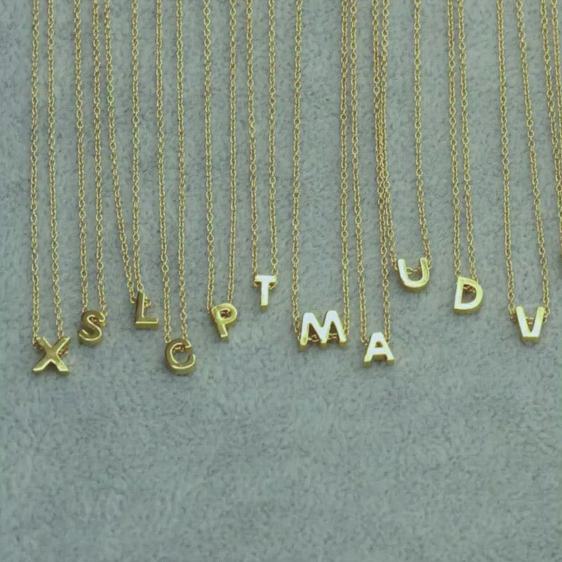 A video showing the Initial Charm Necklace.