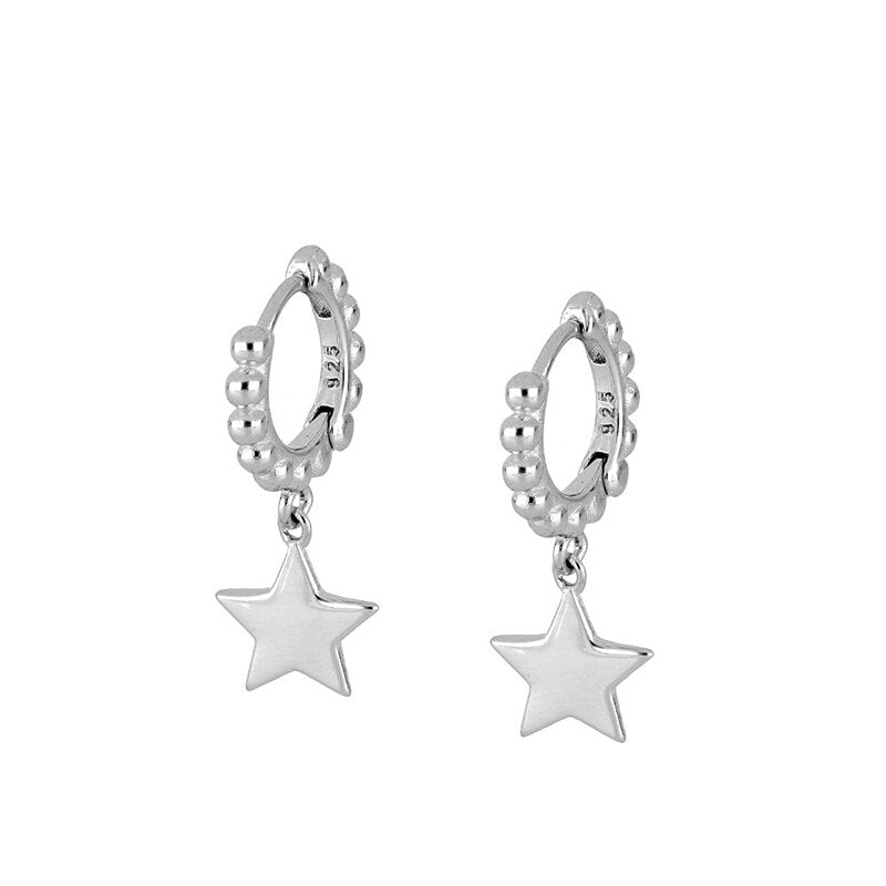 Beaded Star Huggies in silver.