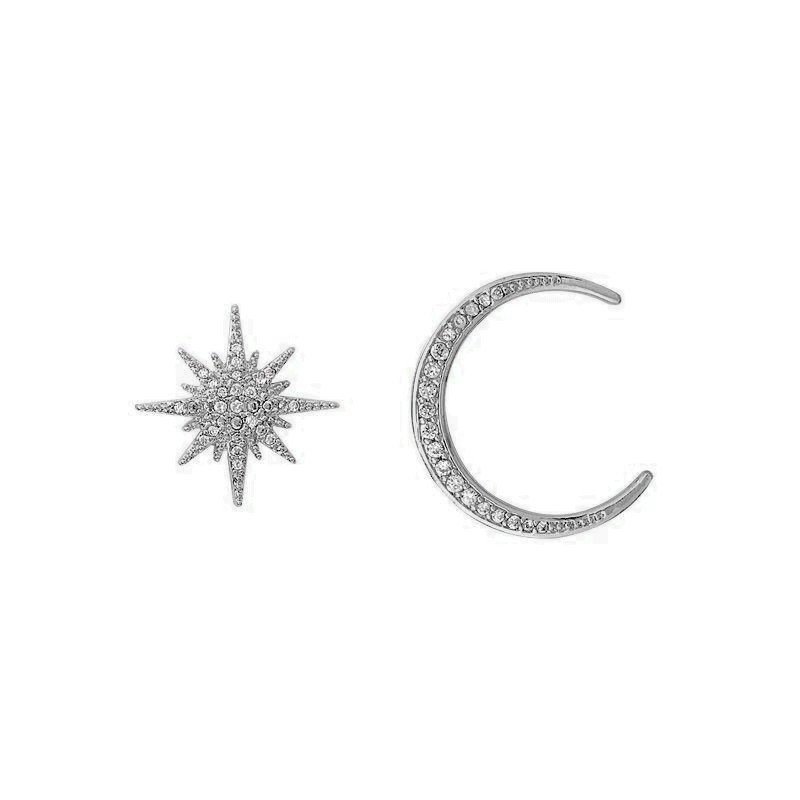 Asymmetrical Star Moon Earrings in silver.