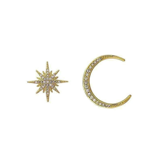 Asymmetrical Star Moon Earrings in gold.
