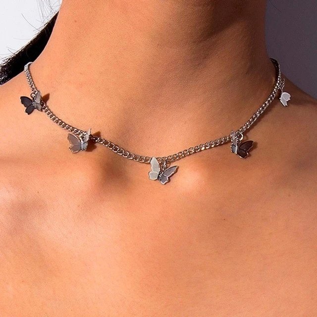 A model wearing the Butterfly Choker Necklace in silver.