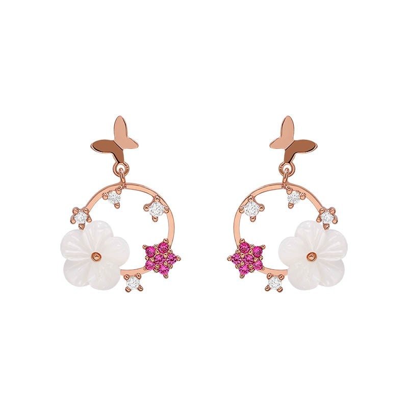 Rose gold butterfly drop earrings with resin flowers and CZ stones.