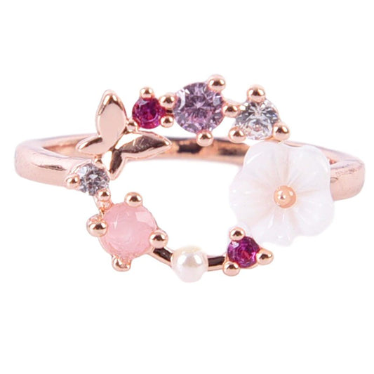 Butterfly flower wreath ring in rose gold.