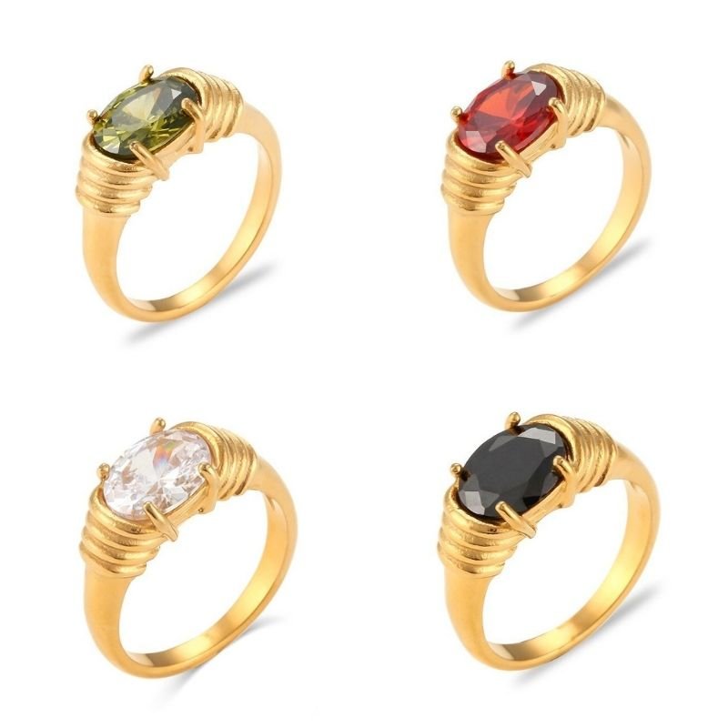 Gold rings with colored CZ stones.