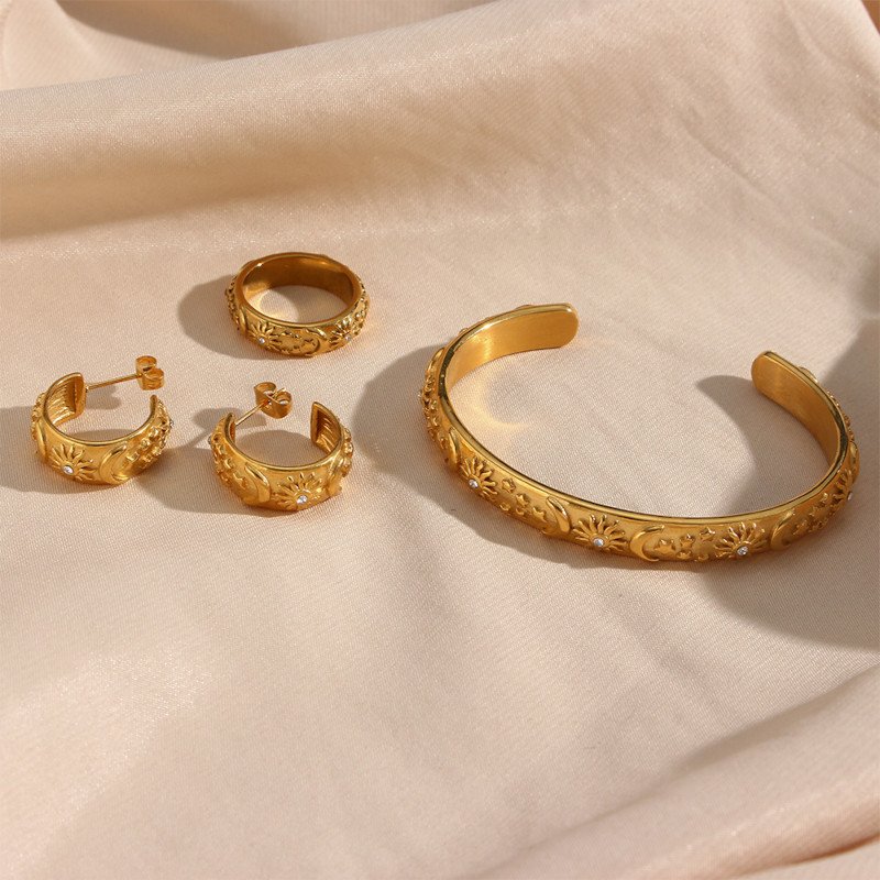 Gold Celeste Hoops, Ring and Bracelet.