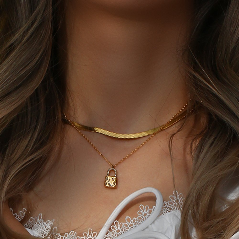 A model wearing the Celestial Moon Padlock Gold Necklace.