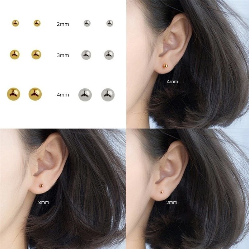 A model wearing classic studs in three sizes.