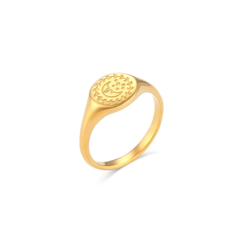 Gold crescent moon signet ring.