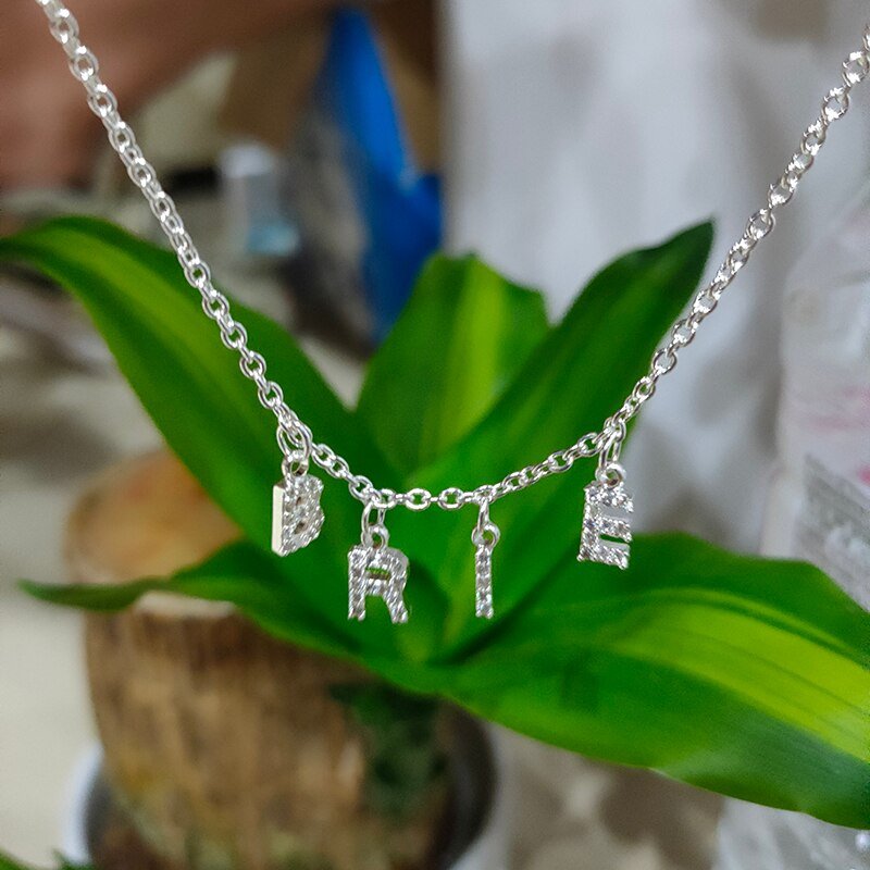 Closeup of the Custom Crystal Name Anklet.
