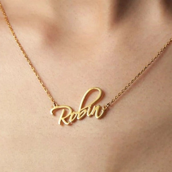 Customized cursive name plate necklace.