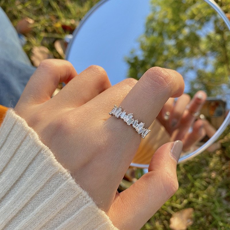 A woman wearing the CZ Baguette Ring.