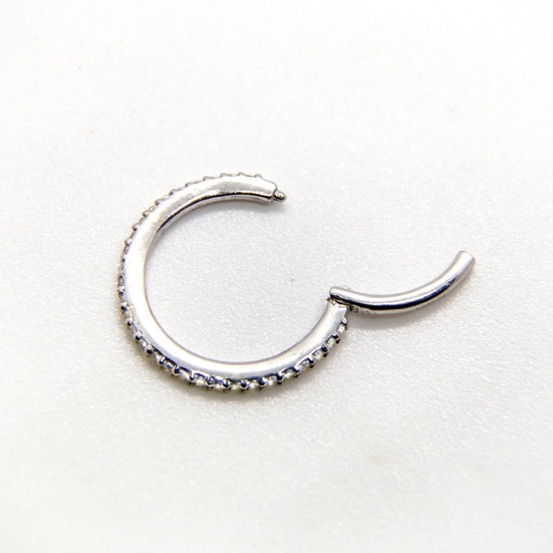 Closeup of the closure of the CZ Pave Cartilage Hoops.