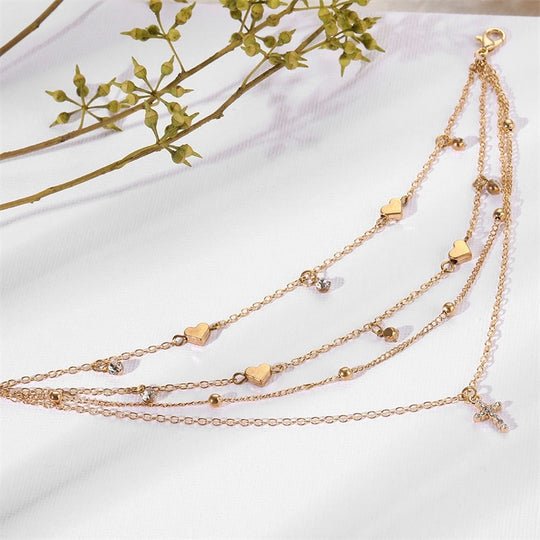 Full view of the Dainty Cross Gold Anklet Set.