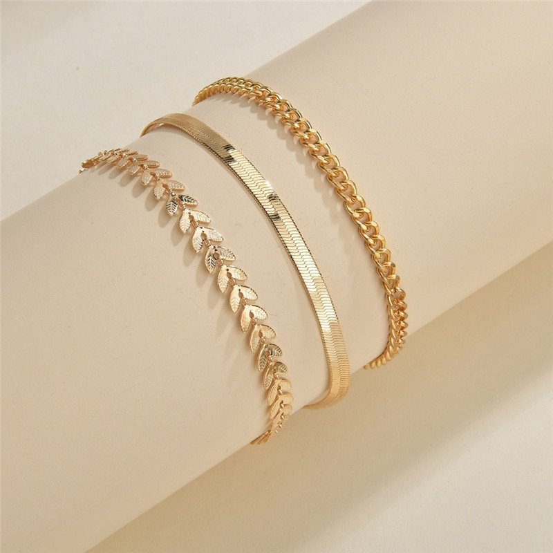 Closeup of the Evelyn Gold Anklet Set.