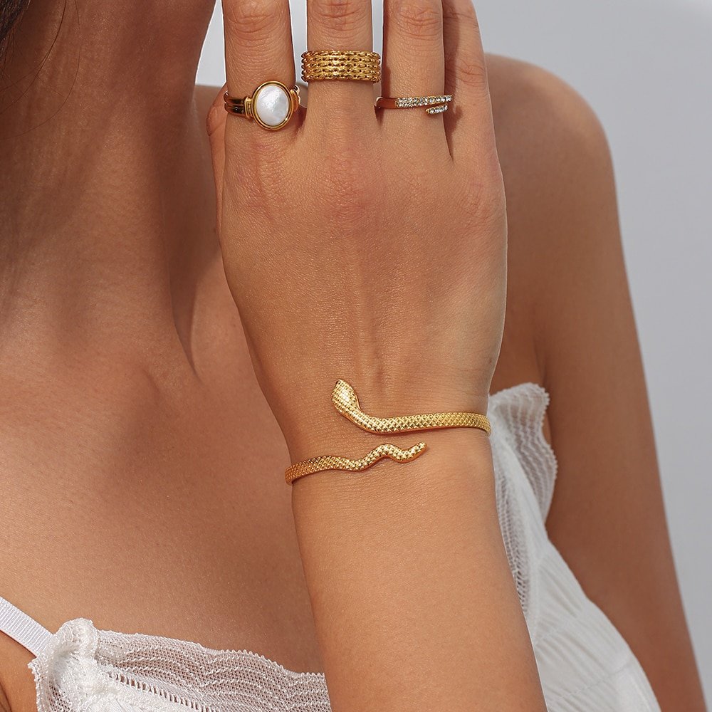 A model wearing the Gold Snake Wrap Bracelet.
