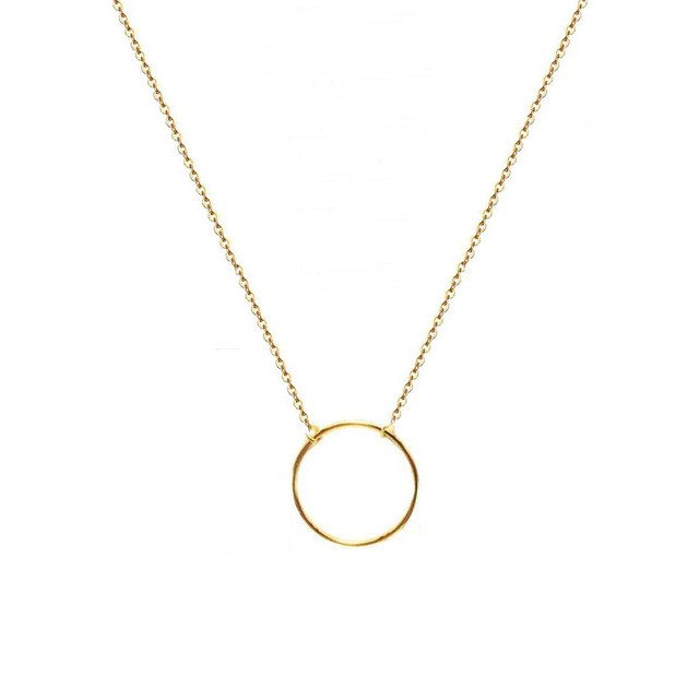 Minimal necklace with circle pendant in gold.