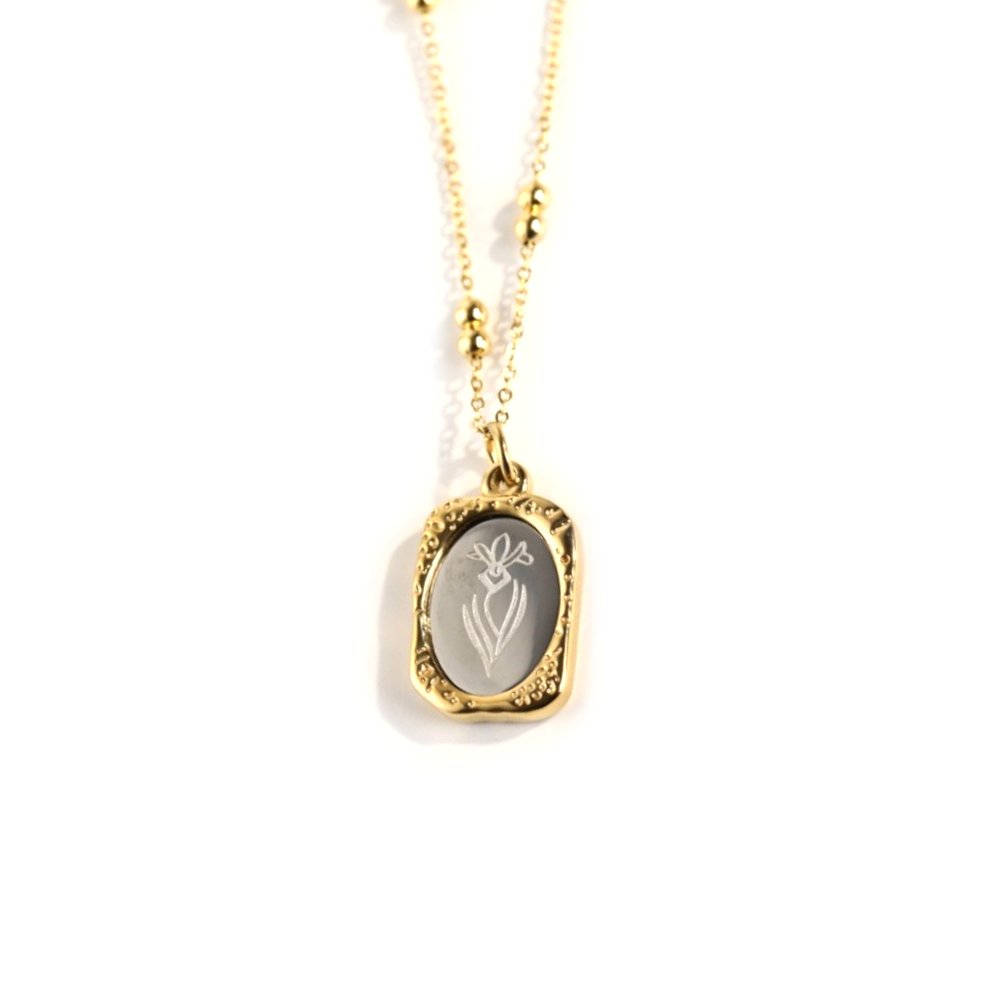 February Iris Mirrored Birth Flower Gold Necklace.