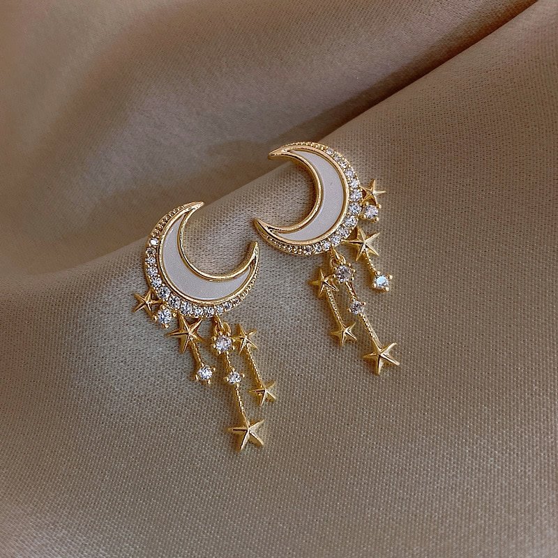Crescent moon earrings with CZ stones.